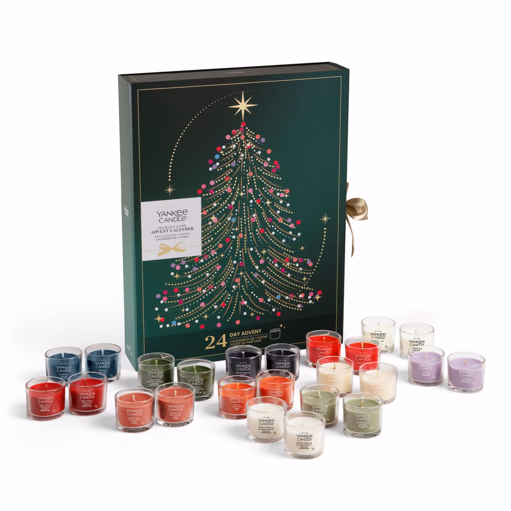 The green book box with the 24 coloured votives lined up in front of it