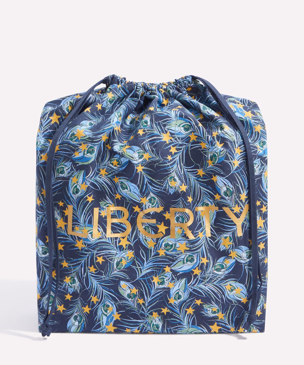 The Liberty-print Festive Plume drawstring bag that comes in the calendar