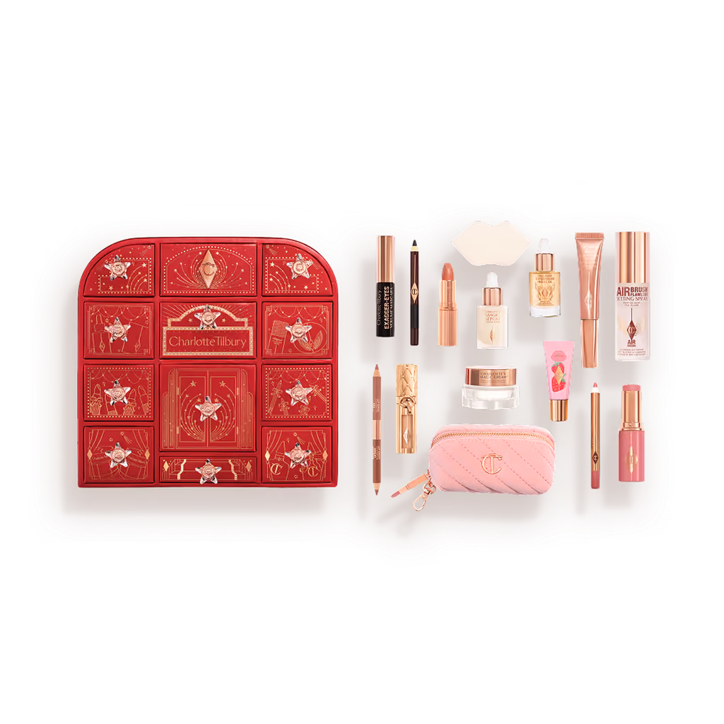 The closed chest with all 15 items laid out beside it, the pink makeup bag in front