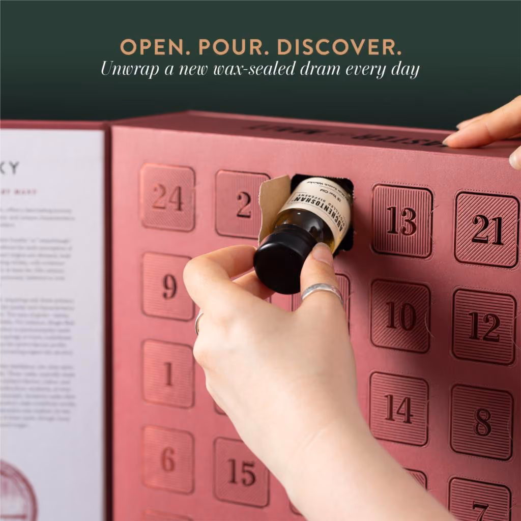 A hand pulling a wax-sealed dram out of one of the numbered doors