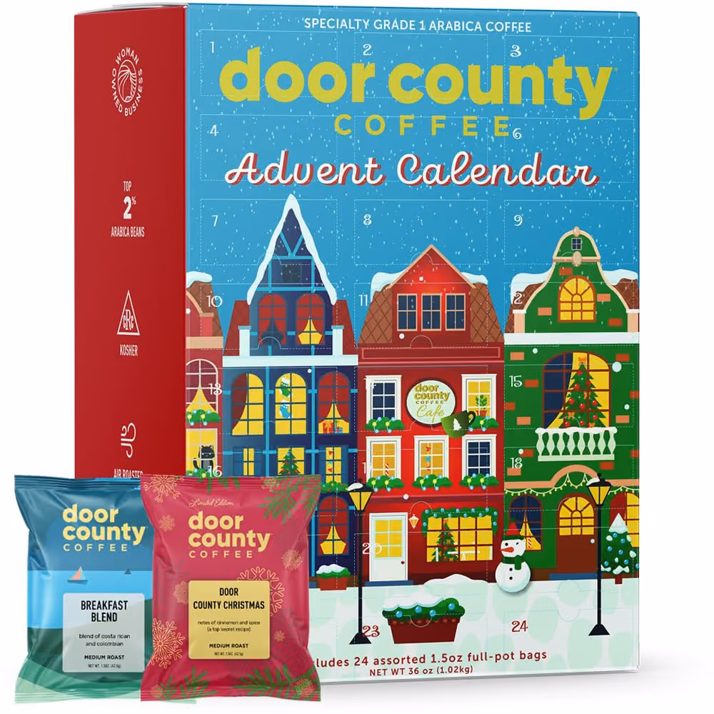 The blue shopfront box with the Breakfast Blend and Door County Christmas pouches in front