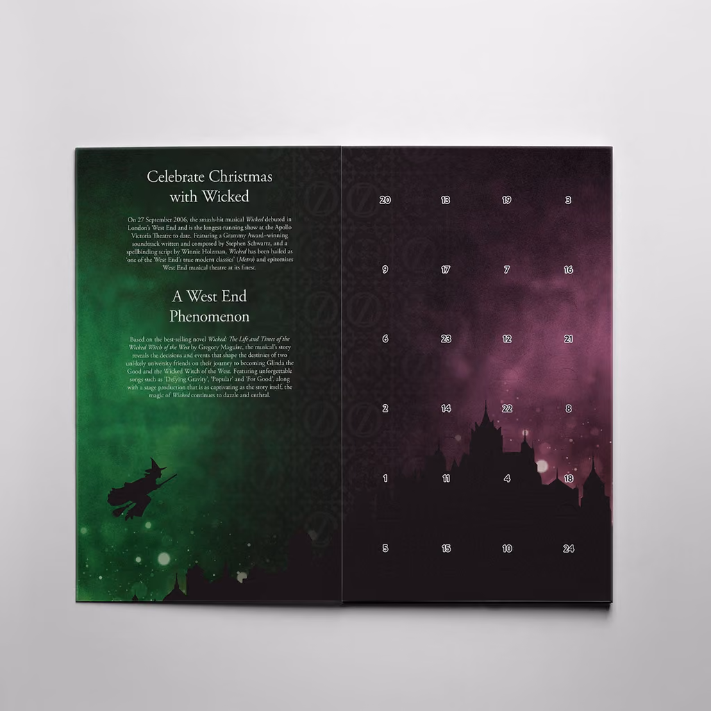 The Wicked 2026 calendar open, with the coin card behind door 24