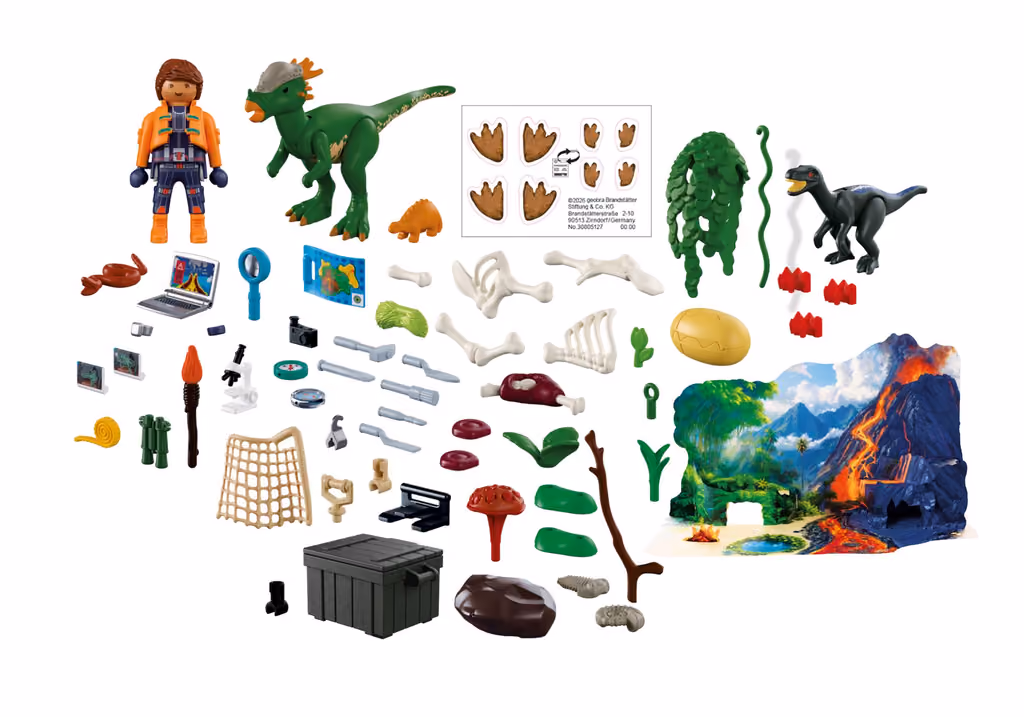 All 71 pieces laid out: figure, dinosaurs, eggs, tools and plants