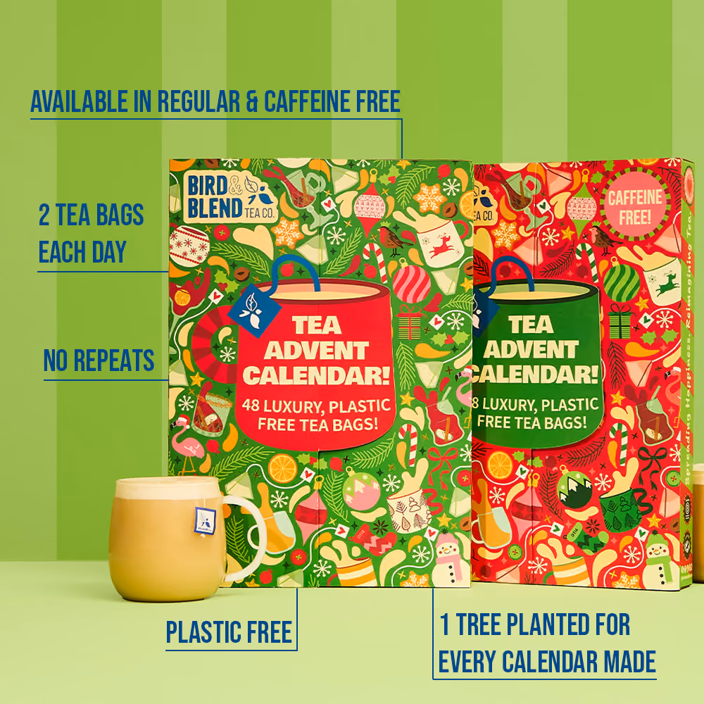 The green regular and red caffeine-free boxes side by side with a mug