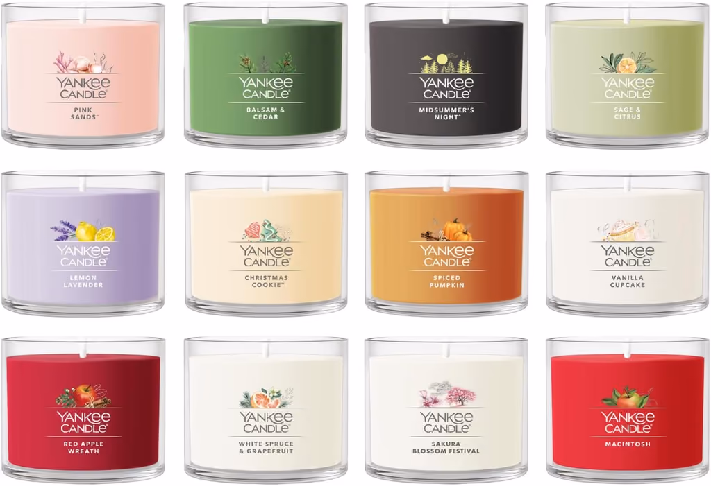 The twelve mini votives in three rows, each labelled with its scent