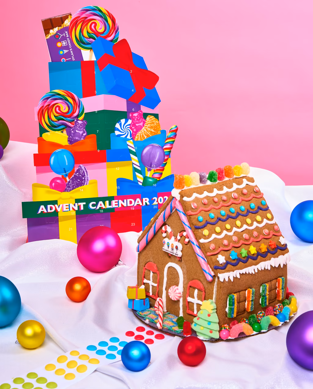 The calendar next to a candy-covered gingerbread house