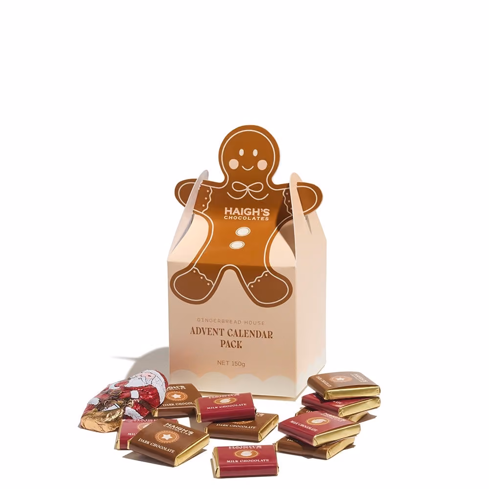 The gingerbread-man filling box with foiled squares and a Santa in front