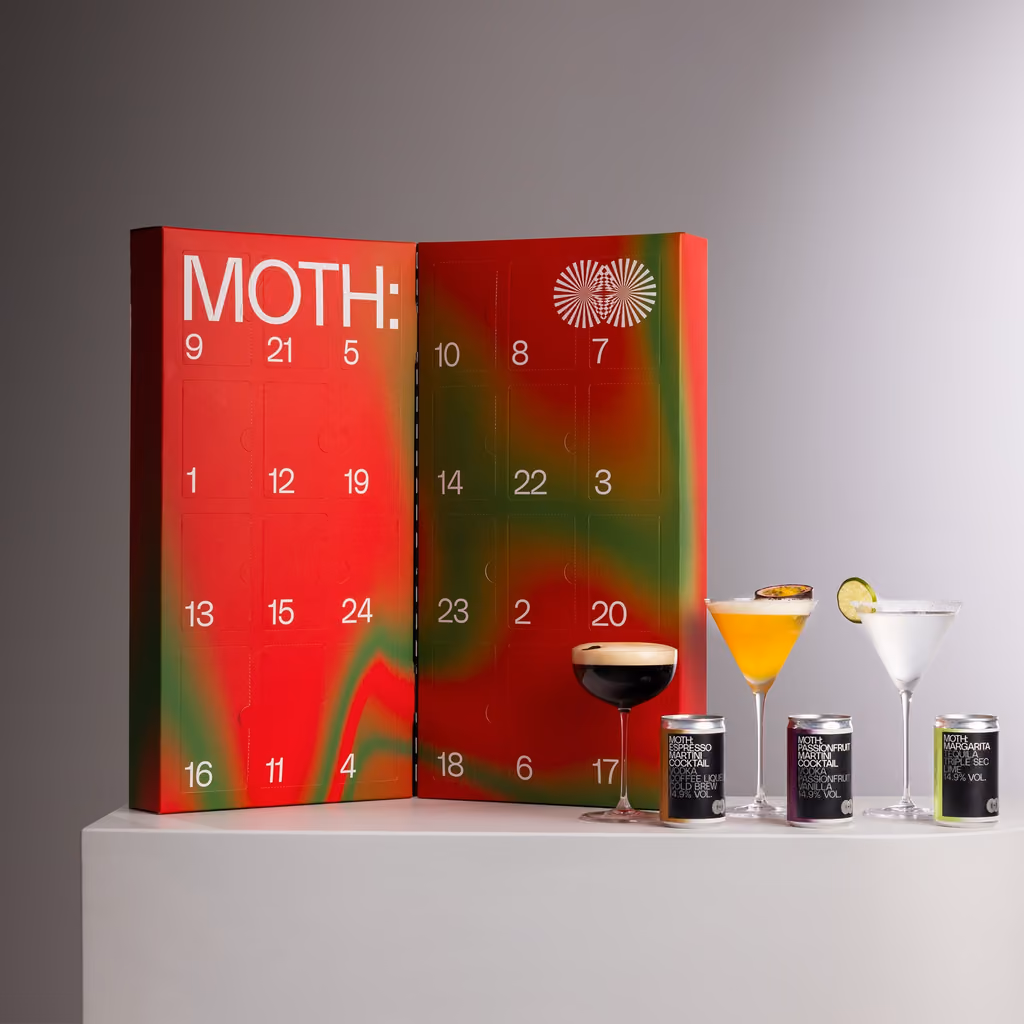 The red and green box with an Espresso Martini, two cocktails and three cans in front