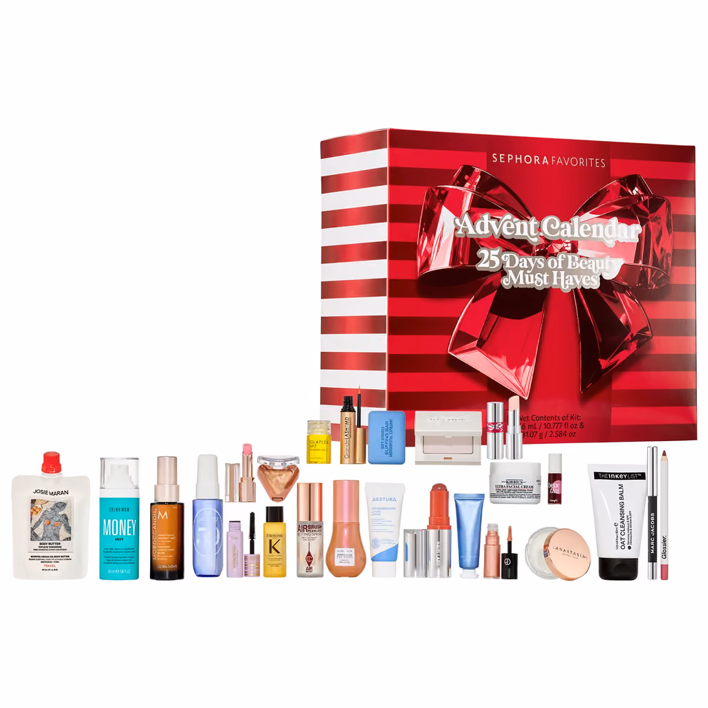 The red striped 25 Days of Beauty Must Haves box with all 25 products in front of it