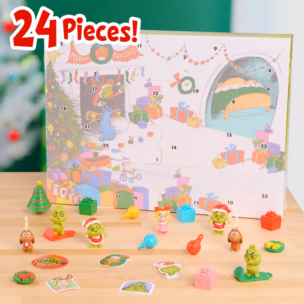The calendar standing open with figures and presents laid out in front