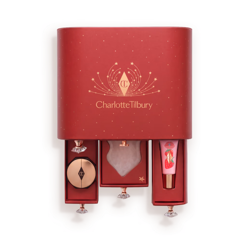 The outer red gift box with three of the jewel-handled drawers pulled open beneath it