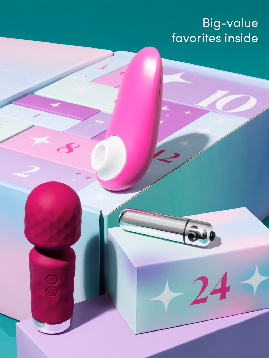 The Womanizer Starlet 3, mini wand and bullet on the open pink drawers