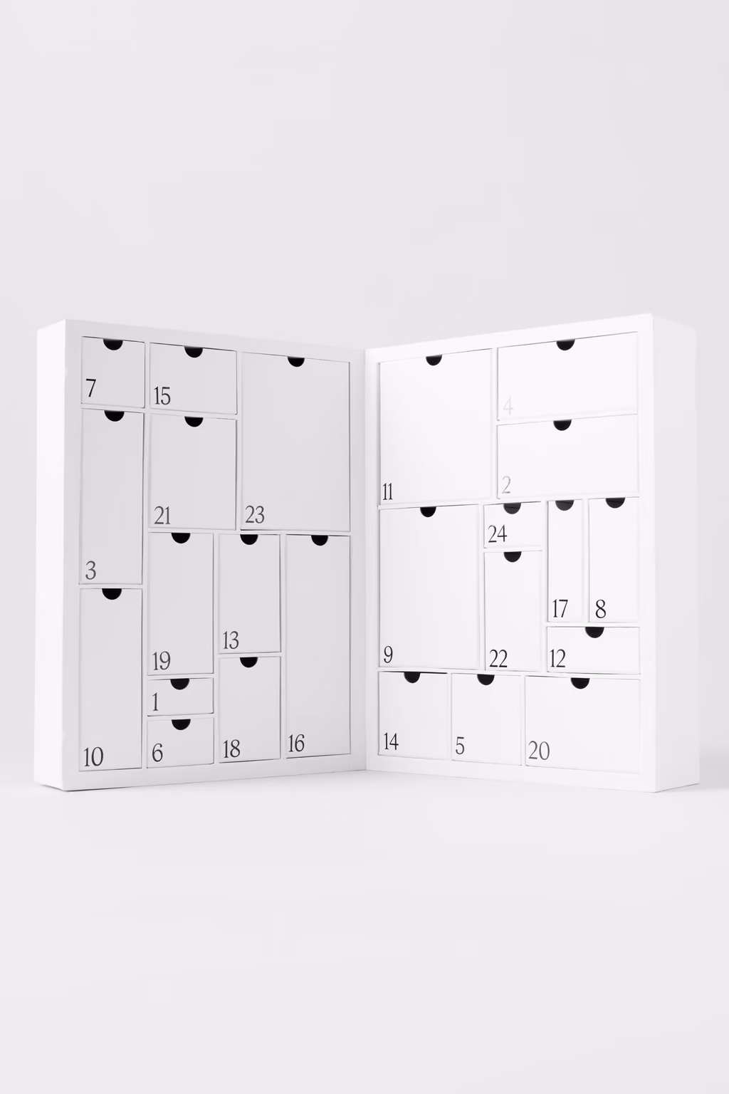 The white box opened like a book onto 24 numbered drawers