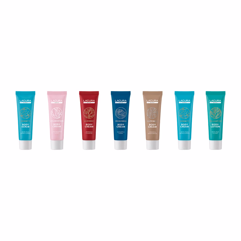 Seven Lacura Spa tubes: a body scrub, five body creams and a body lotion