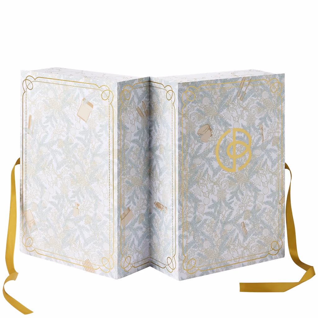 The Cult Beauty 2026 box standing open like a book, ribbons untied