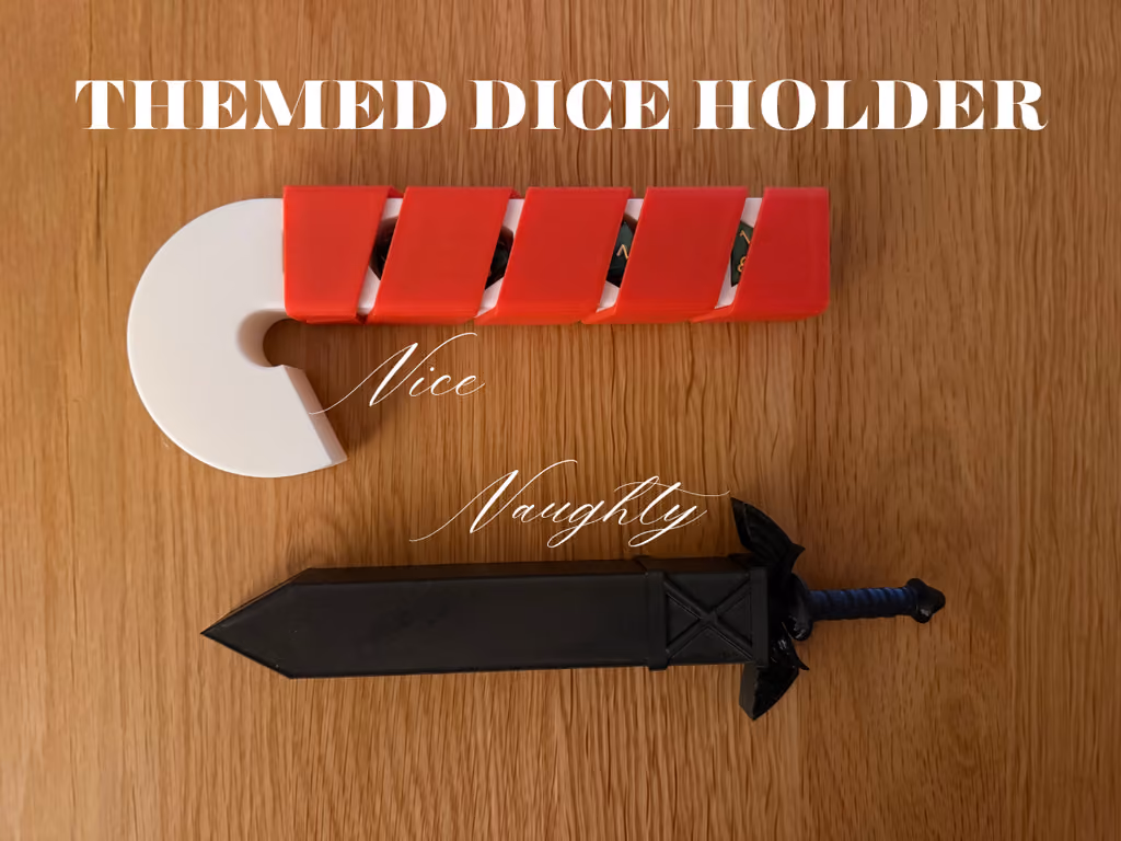 The themed dice holder in white and red for Nice and black for Naughty