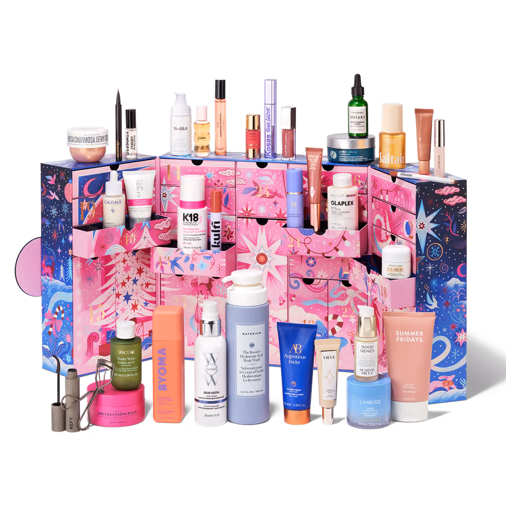 The Space NK 2026 calendar open, with its 35 products standing in and around the pink drawers