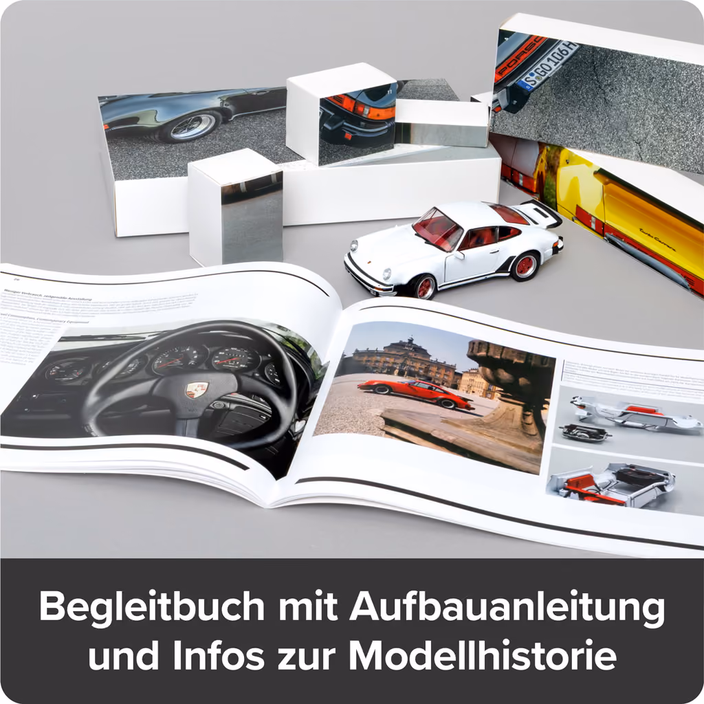The companion book open at a spread of 911 Turbo photographs