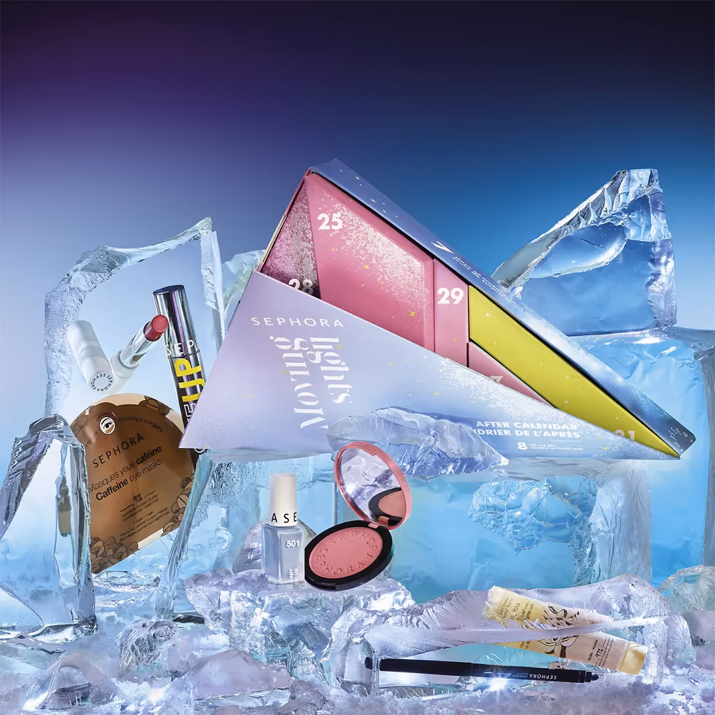 The triangular box on ice with a blush, polish and pencil around it