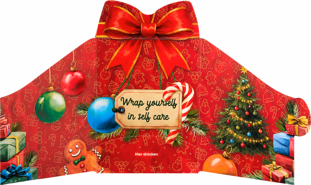 The front panel folded out, with the bow and the gift tag