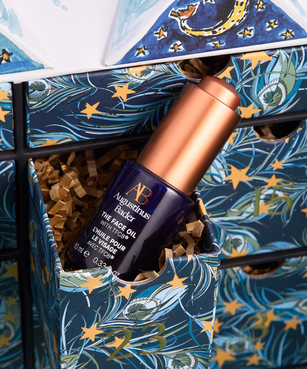 One drawer of the Liberty Beauty 2026 calendar open, the Augustinus Bader face oil sitting in shredded paper