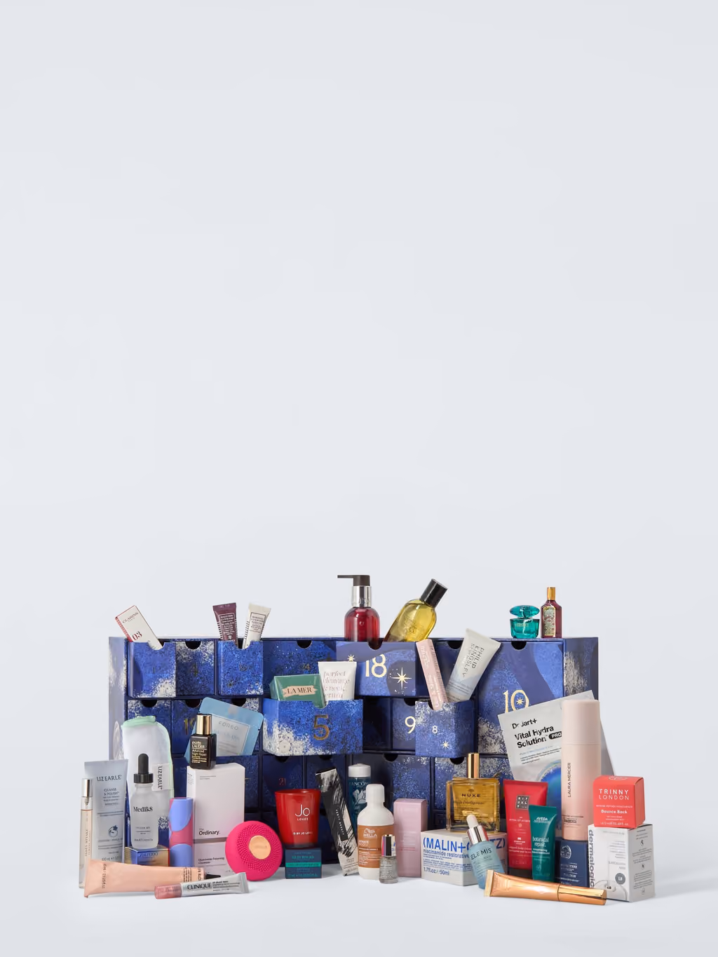 The John Lewis Beauty 2026 calendar open with its 41 products standing in the drawers and in front