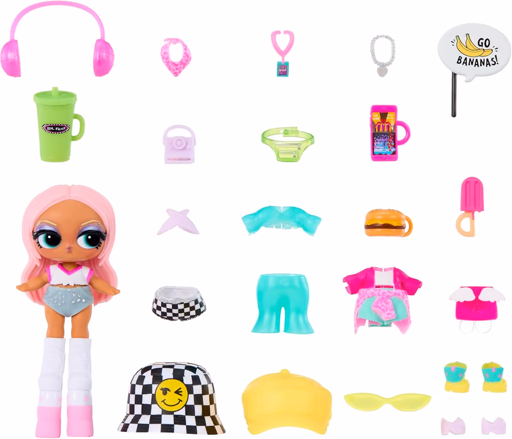 The Tot doll with all her outfit pieces and accessories laid out