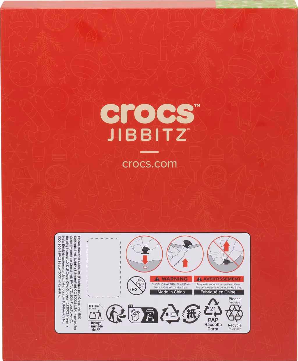 The red back of the box with the Crocs Jibbitz logo and safety panel