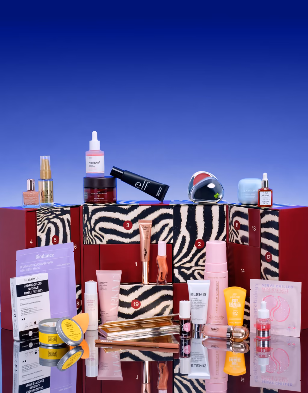 The ASOS 2026 box from the side, products arranged in front on a mirrored surface