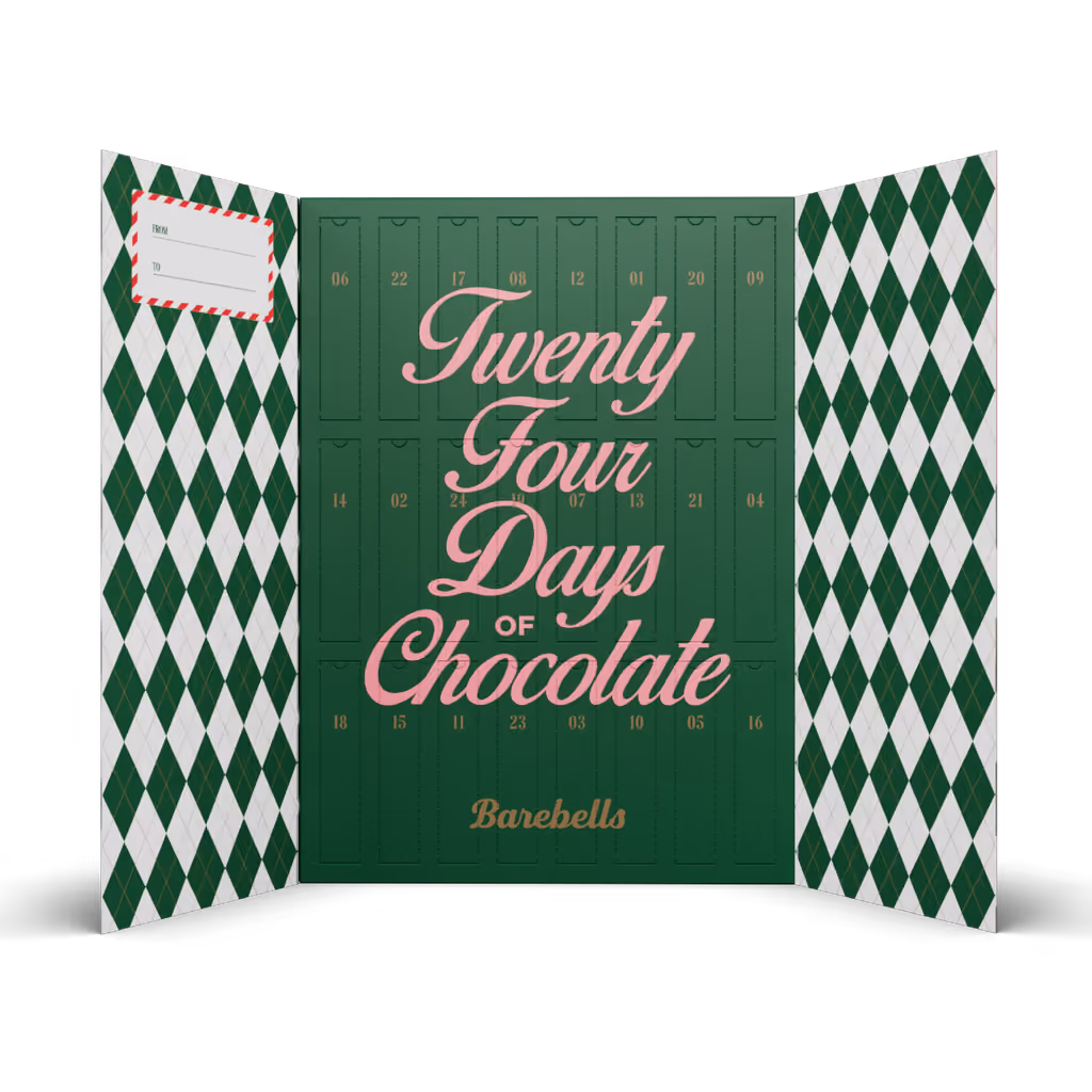 The box opened out, green inner panel with the numbered doors and Twenty Four Days of Chocolate in pink script